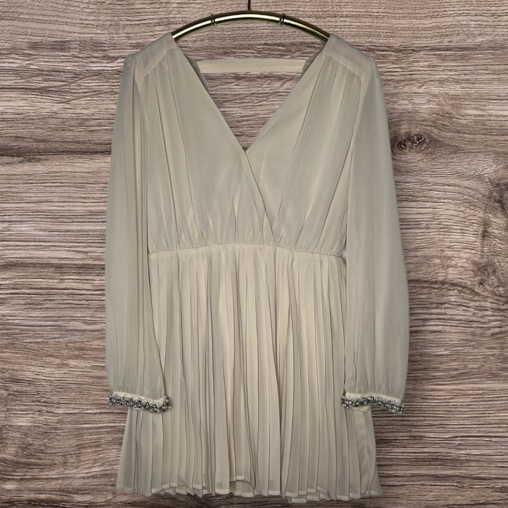 Elegance Redefined: Xtaren Polyester Dress with Jeweled Accents